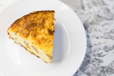 Kuru üzümlü ve vanilyalı lezzetli bir sütlaç..