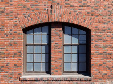 A close up abstract photo of old windows in a brick building in downtown Spokane, Washington.