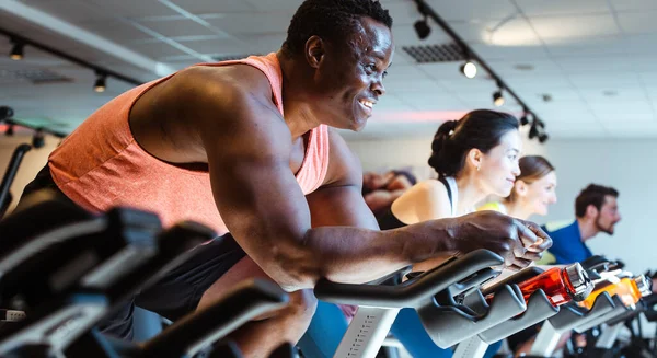 African Man Friends Exercising Fitness Bike Gym — Stock Photo, Image