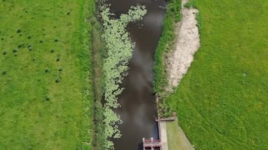 Canals, polders and gravel roads in Nemunas delta, Lithuania, aerial view