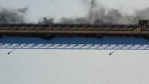 Wooden Bridge Snowy Frozen Lake Aerial View — Video Stock