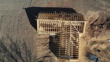 New Wooden house frame construction, aerial view