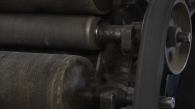 Historical  restored woolen mill equipment wheels working, Lithuania