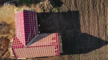 Drone fly up above house roofing work place, aerial view