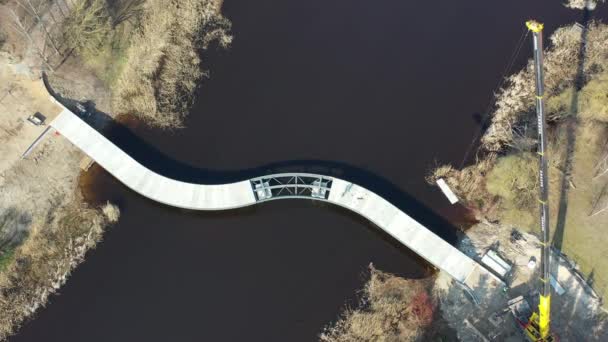 Construction Work New Bridge River Crane Aerial View — Stock Video