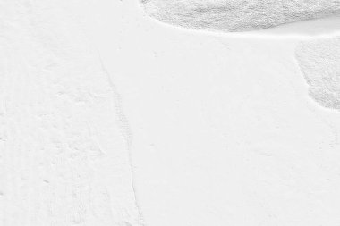 Beyaz kum dokusu zemininin ve duvarın klasik ya da kirli arka planı, kumlu plajlar, rahatlama ve tatil için bir metafor olarak yapılarda ve iç tasarımlarda kullanılan retro model düzeni olarak kullanılır. 