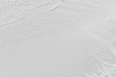 Beyaz kum dokusu zemininin ve duvarın klasik ya da kirli arka planı, kumlu plajlar, rahatlama ve tatil için bir metafor olarak yapılarda ve iç tasarımlarda kullanılan retro model düzeni olarak kullanılır. 