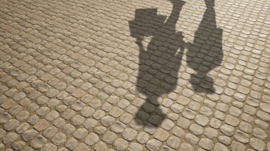 Görüntü olarak insan gölgesi olan zemin dokusu yüzeyinin kavramsal veya kavramsal arkaplanı. Çocukluk eğitiminin 3 boyutlu bir metaforu, eğlenceli mutlu aile çocuk ebeveyn ilişkisi tasarımı