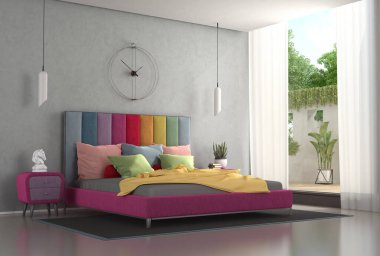 Modern bir yatak odasında renkli yatak başlığı ve komodinli çift kişilik yatak odası.