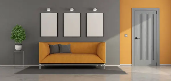 风格别致的生活空间 带有橙色沙发 空白的艺术品框架 简约的装饰和紧闭的门 3D渲染 免版税图库照片