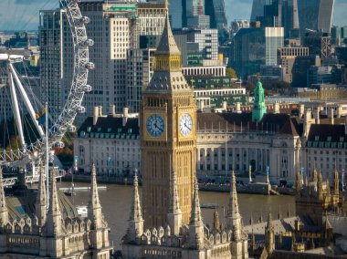 London, UK, October 2022: Big Ben and the London Eye