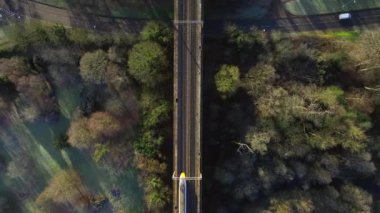 Commuter Train Passing Through a Town Bird's Eye View