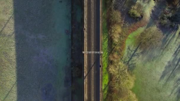 Fast Commuter Train Passing Viaduct Bird Eye View — Stockvideo