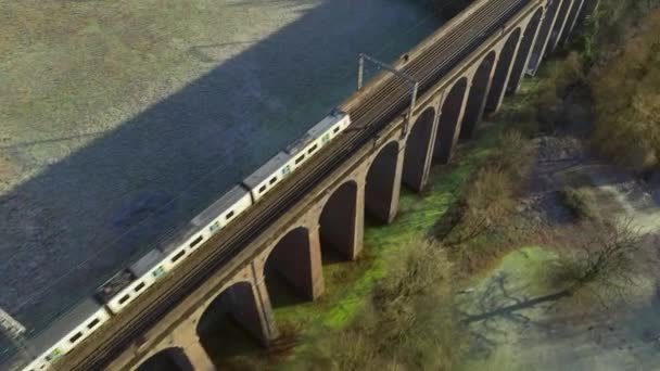 Commuter Train Passing Beautiful Viaduct Evening — Stockvideo