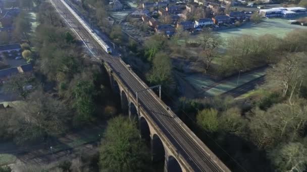 Commuter Train Passing Beautiful Viaduct Evening — Stock video