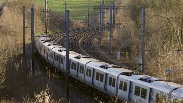 Commuter Train Travelling Railway Infrastructure — Vídeos de Stock