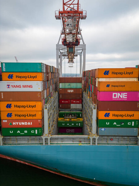 Southampton UK, 2023, A Container Ship is Loaded with Cargo and Goods