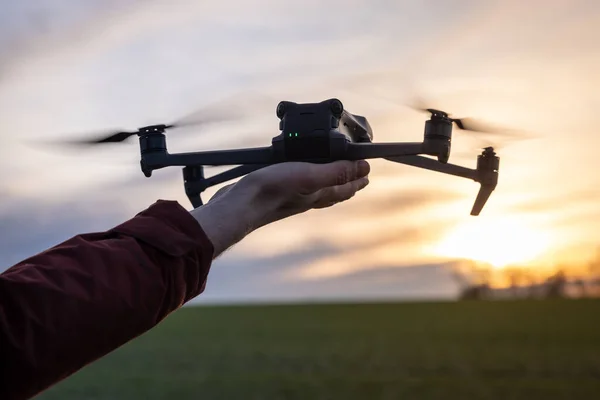 Aerial Drone Lands on the Palm of a Hand