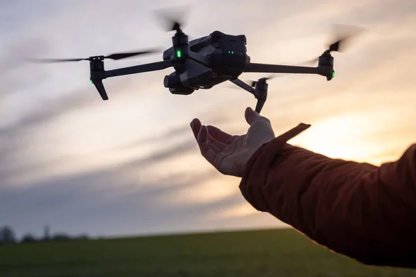 Drone Pilot Controls Drone to Take Off From Hand