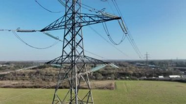 Aerial View of an Industrial High Voltage Lattice Electrical Power Line Tower