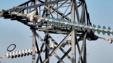Close Up View of Industrial High Voltage Lattice Power Line Tower