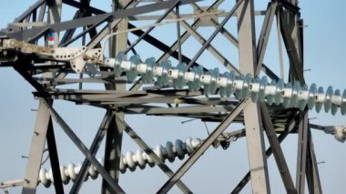 Close Up View of Industrial High Voltage Lattice Power Line Tower