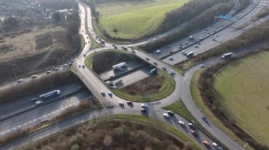 UK M25 Motorway Junction Aerial View at Rush Hour