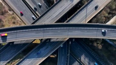 Time Lapse Vehicles Driving on a Highway Interchange Junction Aerial View