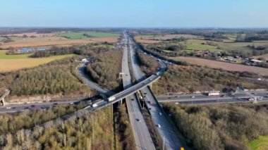 Rush Hour Vehicles Driving on a Highway Interchange Junction Aerial View