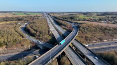 Rush Hour Vehicles Driving on a Highway Interchange Junction Aerial View