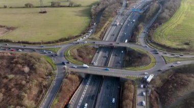 Freeway Roundabout Junction at Rush Hour Aerial View