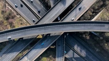 Rush Hour Vehicles Driving on a Highway Interchange Junction Aerial View