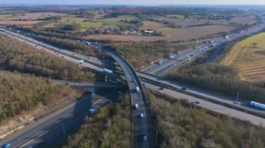 Rush Hour Vehicles Driving on a Highway Interchange Junction Aerial View