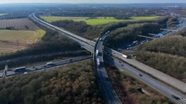 Rush Hour Vehicles Driving on a Highway Interchange Junction Aerial View