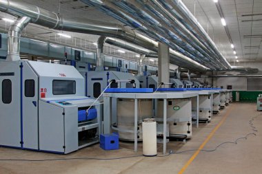 LUANNAN - MARCH 13: Machinery and equipment in a spinning production company, March 13, 2013, Luannan County, Hebei Province, china