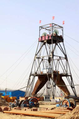 MACHENG - March 13: Drilling derrick in MaCheng iron mine on march 13, 2014, Luannan County, Hebei Province, Chin