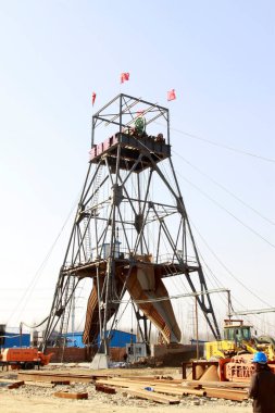 MACHENG - March 13: Drilling derrick in MaCheng iron mine on march 13, 2014, Luannan County, Hebei Province, Chin