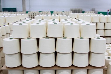 LUANNAN - MARCH 13: Cotton-waste piled up in the production workshop in a spinning production company, March 13, 2013, Luannan County, Hebei Province, china