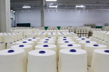 LUANNAN - MARCH 13: Cotton-waste piled up in the production workshop in a spinning production company, March 13, 2013, Luannan County, Hebei Province, china