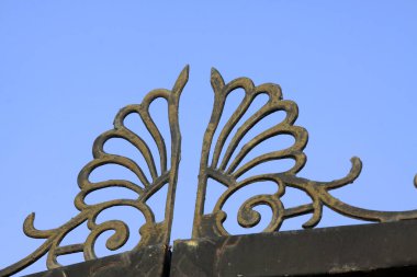 oxidize wrought iron decoration, closeup of photo