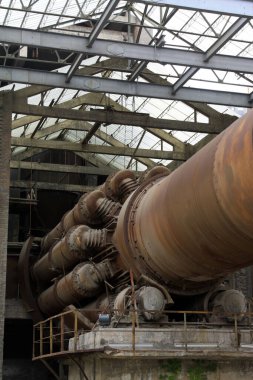 abandoned rotary kiln, in a cement plant, closeup of photo