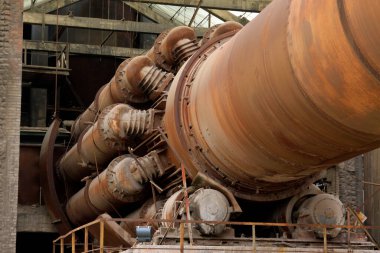 abandoned rotary kiln, in a cement plant, closeup of photo