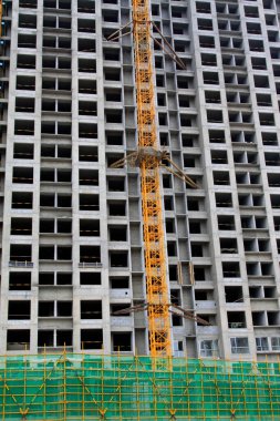 Unfinished buildings, closeup of photo
