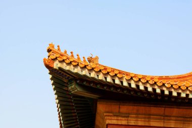 Red glazed tile eaves and wall, Eastern Tombs of the Qing Dynasty, China.