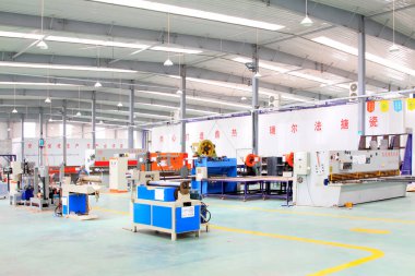 LUANNAN COUNTY - MAY 27: mechanical equipment in a production workshop, on may 27, 2014, Luannan county, Hebei Province, China