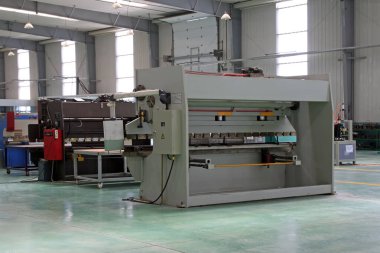 Large mechanical equipment on the production line, closeup of photo 