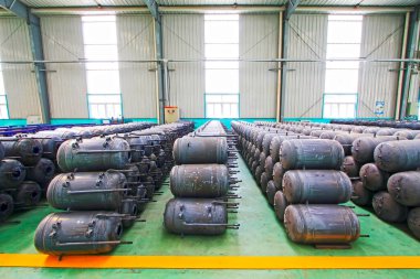 Metal pressure tank piled up together, closeup of photo 