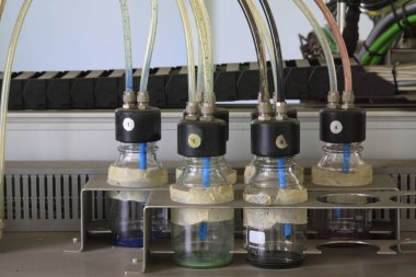 Piping and mechanical device in a factory, closeup of photo 