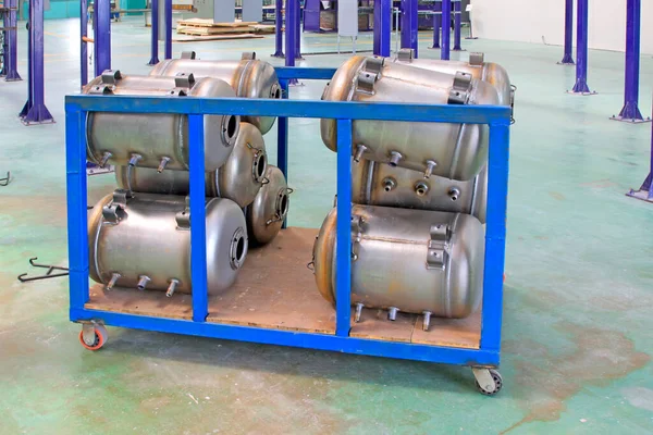 Stainless steel pressure tank piling up together, closeup of photo