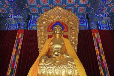 Yi County, China - November 5, 2017: The Buddha statue is worshipped in the Mahavira hall in a temple, Yi County, Hebei Province, China